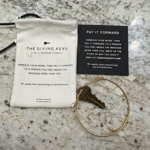 The Giving Keys ‘Strength’ Gold Key Bangle Bracelet.